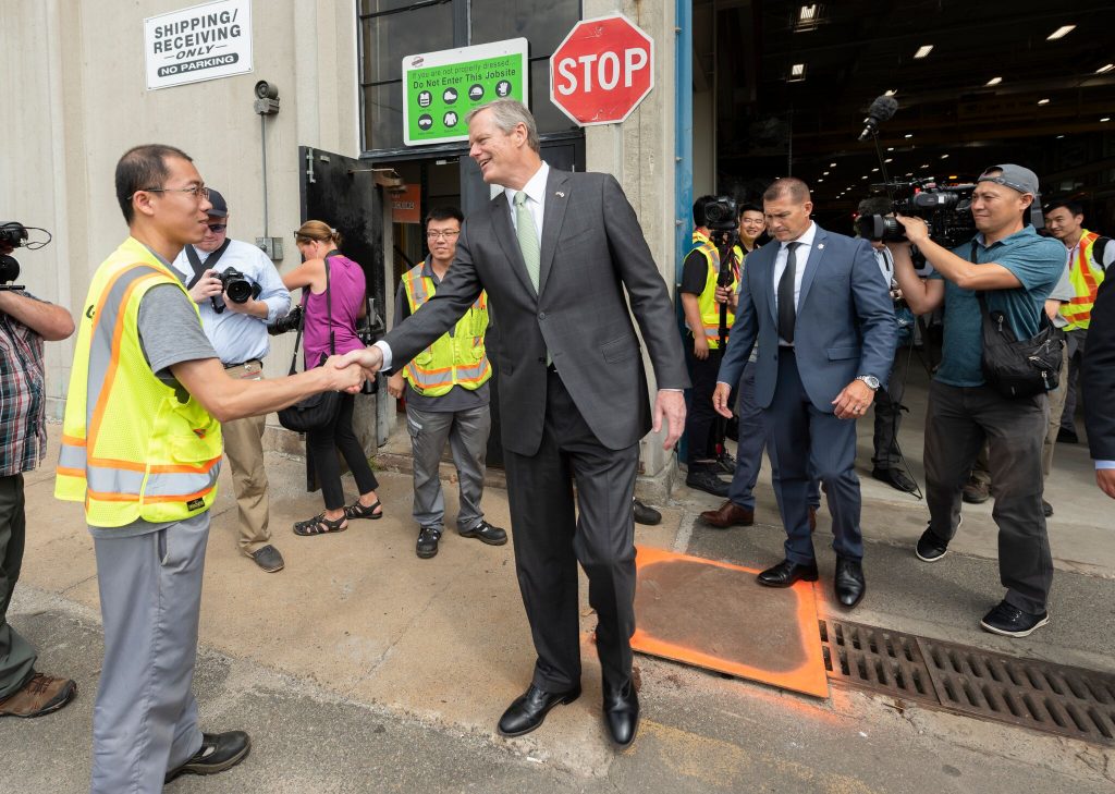 Governor Baker shakes hands with CRRC employee